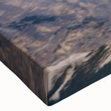 Close-up of a vibrant, stretched canvas showcasing a colorful birds of prey design, highlighting intricate details and textures, perfect for home decor.