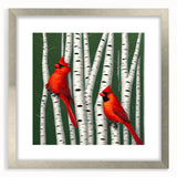 Framed wall art featuring a vibrant cardinal bird design, elegantly displayed in a silver frame with a mat, perfect for home decor and nature enthusiasts.