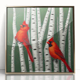 Framed wall art featuring a vibrant cardinal bird design against a gold-acrylic background, perfect for adding a touch of nature to home decor.