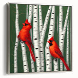 Framed canvas wall art featuring a vibrant cardinal bird design, showcased in a sleek silver frame, ideal for nature-themed home decor. This piece adds a touch of elegance and color to any living space, perfect for bird enthusiasts.