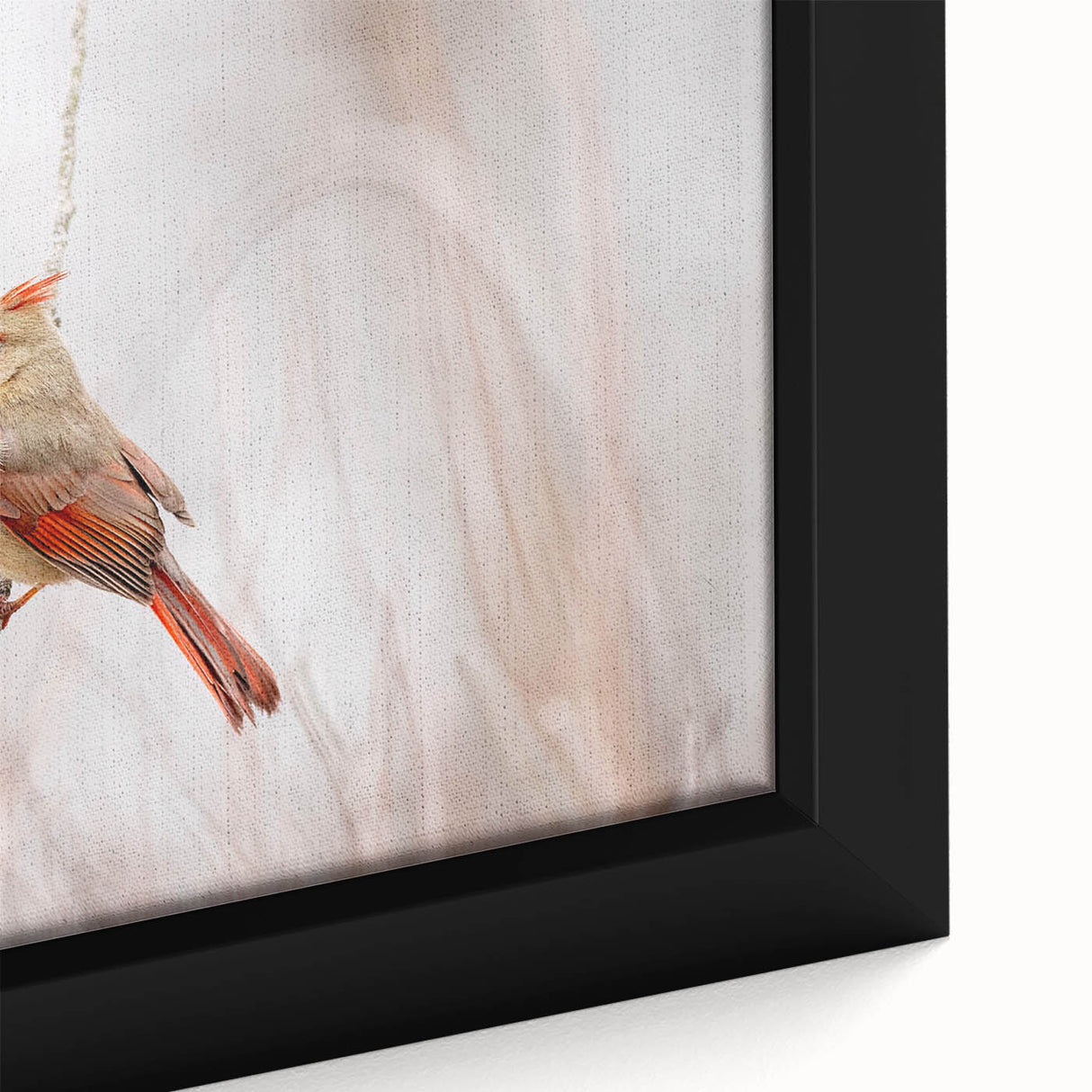 Close-up view of a framed cardinal-themed wall art canvas, showcasing vibrant red and green colors with intricate details, ideal for nature-inspired decor.