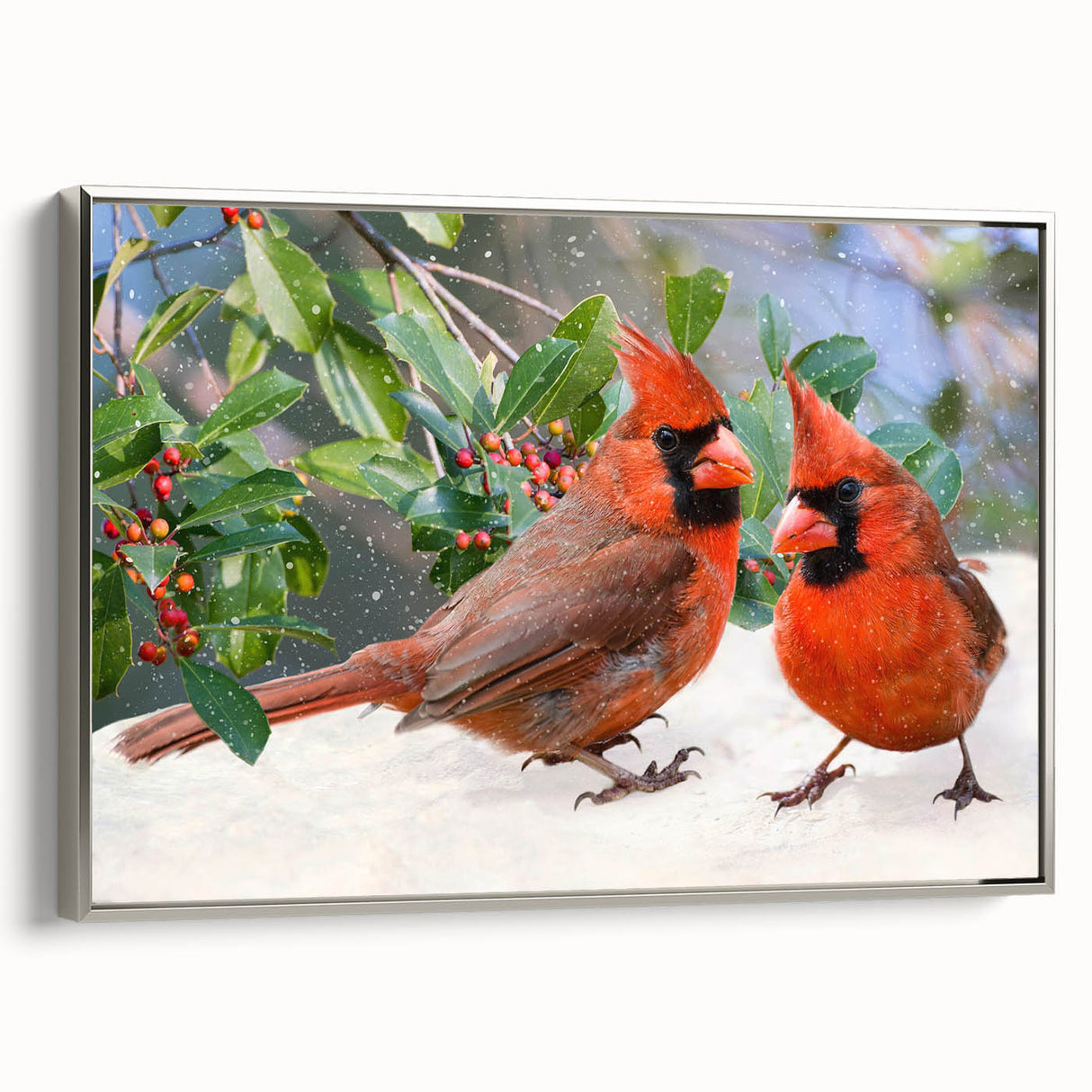 Framed canvas wall art showcasing a vibrant cardinal bird design in a silver frame, ideal for home decor, adding a touch of nature-inspired elegance to any room.