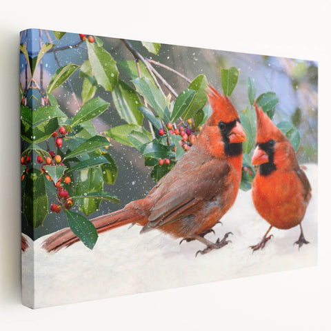 Stretched canvas wall art featuring vibrant red cardinals perched on branches, showcasing intricate details and natural colors, perfect for home decor.