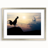 Framed wall art featuring a whimsical chicken design in vibrant colors, set in a sleek silver frame with a mat, perfect for adding a playful touch to home decor.