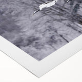 Elegant rolled canvas featuring a serene crane design in shades of blue and white, perfect for adding a touch of tranquility to any home decor. Packaged securely in a cardboard tube for safe delivery.