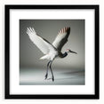 Framed wall art featuring an elegant crane design, set in a sleek black frame with matting, ideal for modern home decor and nature enthusiasts.