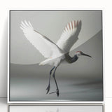 Framed wall art showcasing an elegant crane design in a modern white frame, perfect for adding a touch of sophistication to home decor, ideal for nature and bird lovers.