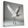 Stretched canvas wall art showcasing a graceful crane design in serene colors, ideal for enhancing modern home décor. Perfect for nature lovers and minimalistic interiors.