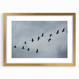 Elegant wall art featuring a crane design in a gold frame with matting, perfect for adding sophistication to home decor. Ideal for bird lovers and art enthusiasts.