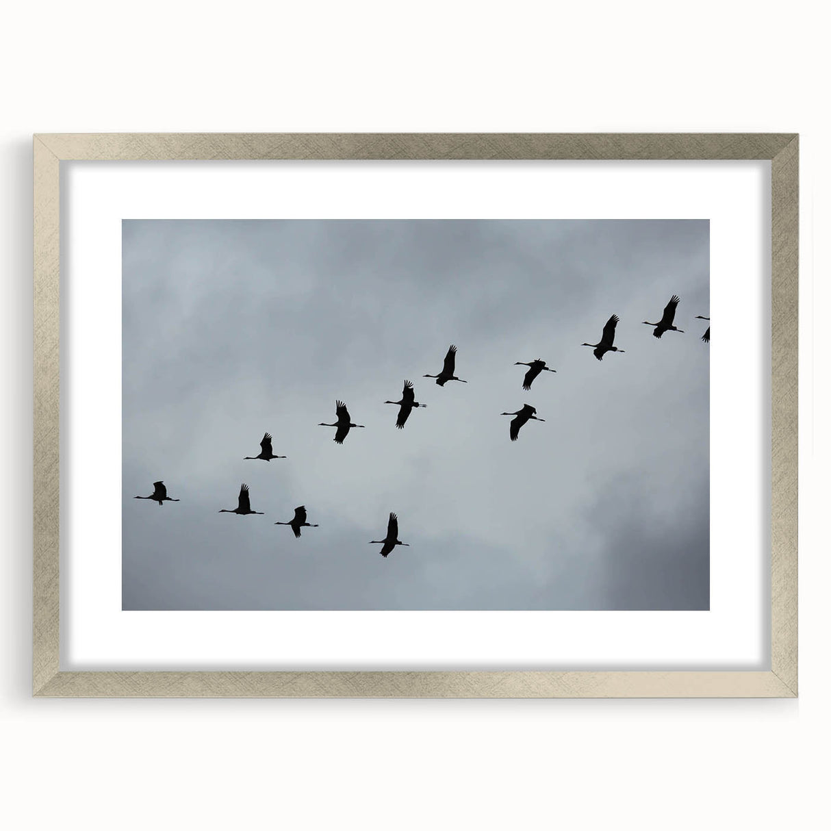 Framed wall art featuring a delicate crane design in silver, showcasing elegant details and a modern aesthetic, perfect for enhancing home decor.