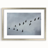 Framed wall art featuring a delicate crane design in silver, showcasing elegant details and a modern aesthetic, perfect for enhancing home decor.