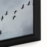 Close-up of a framed canvas wall art piece featuring an elegant crane design, showcasing intricate details and vibrant colors against a textured background, perfect for home decor.