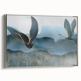 Framed wall art showcasing an elegant silver crane design on canvas, offering a sophisticated touch to home decor with a modern aesthetic.