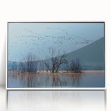 Framed wall art featuring an elegant crane design in a contemporary style, set in a sleek white frame, perfect for modern home decor. This acrylic piece adds a touch of sophistication and wildlife charm to any interior space.