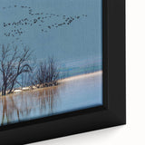 Close-up of a framed wall art piece showcasing an elegant crane design in soft blues and greens, perfect for modern home decor. Ideal for art enthusiasts and nature lovers.