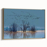 Framed wall art featuring a gold crane design with intricate details, set against a textured background. Ideal for adding elegance to home decor, this canvas piece showcases a modern aesthetic and is perfect for bird lovers.