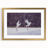 Elegant gold-framed wall art featuring a crane design, showcasing intricate details and a mat, perfect for enhancing modern home decor with an artistic touch.