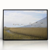 Framed wall art showcasing an elegant crane design, featuring a sleek black border and acrylic finish, ideal for modern decor. Perfect for enhancing living spaces or offices.