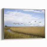 Framed wall art showcasing an elegant silver crane design on canvas, presented in a modern frame, perfect for enhancing contemporary home decor.