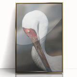 Framed wall art featuring a crane design in elegant gold accents, showcasing a modern aesthetic. The artwork is displayed in a sleek, clear acrylic frame, perfect for enhancing contemporary home decor.