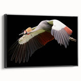 Framed wall art showcasing a black and white crane design, elegantly displayed from the side view, perfect for modern home decor in living spaces.