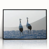 Framed wall art showcasing a stunning crane design in vibrant colors, set against a sleek black frame, perfect for enhancing modern home decor.