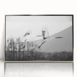 Framed wall art featuring a graceful crane design in a silver-accented frame, showcasing vibrant colors and intricate details, ideal for modern home decor.