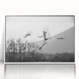 Framed wall art featuring a graceful crane design in a minimalist style, showcased in a white frame, perfect for modern decor. Ideal for bird lovers and nature enthusiasts.