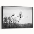 Framed wall art showcasing an elegant crane design in black and white, displayed from a side view with a sleek, modern frame, perfect for contemporary decor.