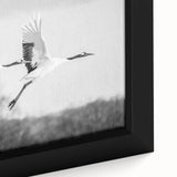 Close-up of a framed canvas wall art piece showcasing an elegant crane design in soft hues of blue and gold, perfect for enhancing modern home decor.