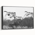 Framed canvas wall art showcasing an elegant crane design in black and white, perfect for modern home decor. Side view highlights the sleek frame and textured finish, adding sophistication to any room.