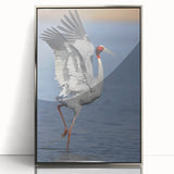 Framed wall art showcasing a graceful crane design in silver tones, adding elegance to any decor. Crafted with acrylic for a modern touch, perfect for art lovers.