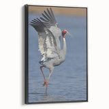 Framed wall art featuring an elegant crane design on textured canvas, showcasing intricate details in black and white, perfect for modern home decor.