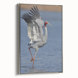 Framed wall art featuring elegant silver cranes in a serene design, showcasing intricate details and a modern aesthetic perfect for home decor.