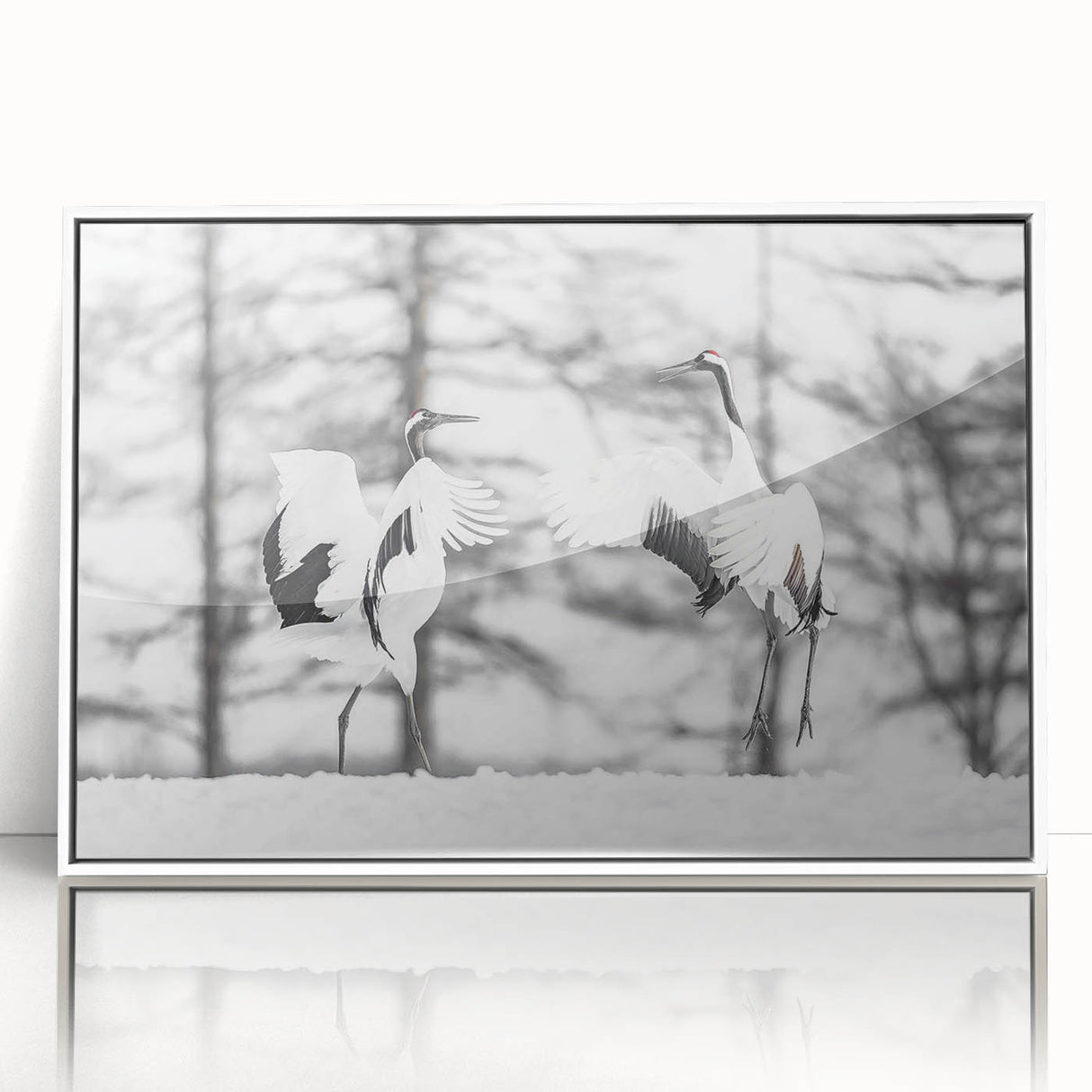Framed wall art featuring an elegant crane design in a white frame, showcasing intricate details and vibrant colors, perfect for enhancing modern home decor.