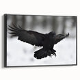Framed wall art featuring a striking black crow and raven design on canvas, showcasing intricate details and textures. The piece has a sleek black frame, ideal for adding elegance to any decor.