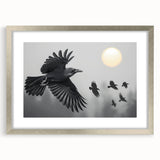 Framed wall art featuring a detailed design of a crow and raven, elegantly displayed with a silver mat and frame, perfect for enhancing modern decor.