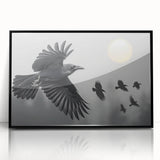Framed wall art featuring an intricate design of a crow and raven, displayed in a sleek black frame, perfect for enhancing modern home decor with a touch of nature.