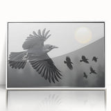 Framed wall art featuring a striking design of a crow and raven, displayed in an elegant white frame, capturing intricate details of the birds against a minimalist background. Ideal for enhancing modern home decor with a touch of nature.