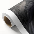Close-up of a rolled canvas art print showcasing a striking design of a crow and raven, featuring bold colors and intricate details, perfect for home decor.
