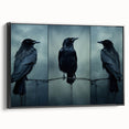 Framed canvas wall art showcasing a striking design of a crow and raven, presented in a sleek black frame, perfect for enhancing modern interior decor.