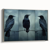 Framed wall art collection showcasing a striking design of a crow and raven in bold black and silver hues, perfect for enhancing modern decor.