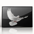 Framed wall art featuring a serene dove design against a black background, showcasing intricate details and vibrant colors, perfect for modern home decor.