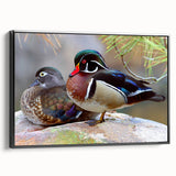 Framed wall art featuring a colorful duck design on textured canvas, presented in a sleek black frame, ideal for modern home decor and nature enthusiasts.