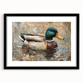 Framed wall art showcasing a vibrant duck design in a black frame with a white mat, perfect for enhancing home decor and adding a touch of nature-inspired elegance.