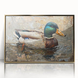 Framed wall art featuring a vibrant gold-accented duck design, set in an elegant acrylic frame, ideal for modern home decor. Perfect for bird lovers and art enthusiasts.