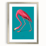 Framed wall art featuring a vibrant flamingo design, set in a sleek silver frame with a mat, ideal for modern home decor and nature enthusiasts.