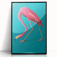 Framed wall art featuring a vibrant flamingo design, displayed in a sleek black frame with acrylic glass, ideal for modern home decor and tropical-themed interiors.