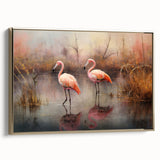 Framed wall art featuring a vibrant flamingo design on canvas, showcasing shades of pink and gold, perfect for adding a tropical touch to home decor.