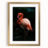 Framed wall art featuring a vibrant flamingo design with gold accents, elegantly matted, perfect for adding a tropical touch to home decor.